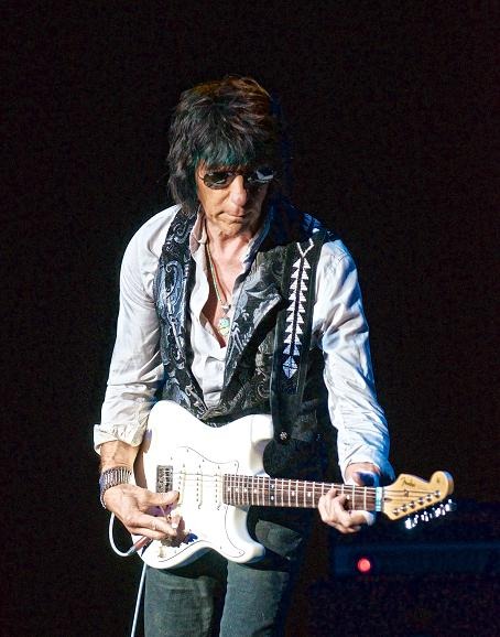 Jeff Beck performing live, photographed by Jim Belmont